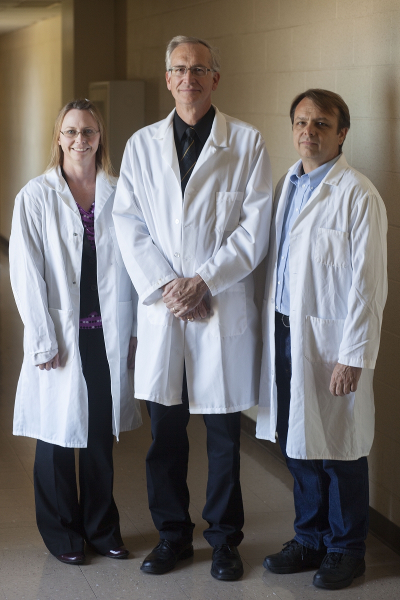 Drs. Kristin Whitworth, Randall Prather and Kevin Wells from the University of Missouri worked to breed pigs that are not harmed by PRRS.